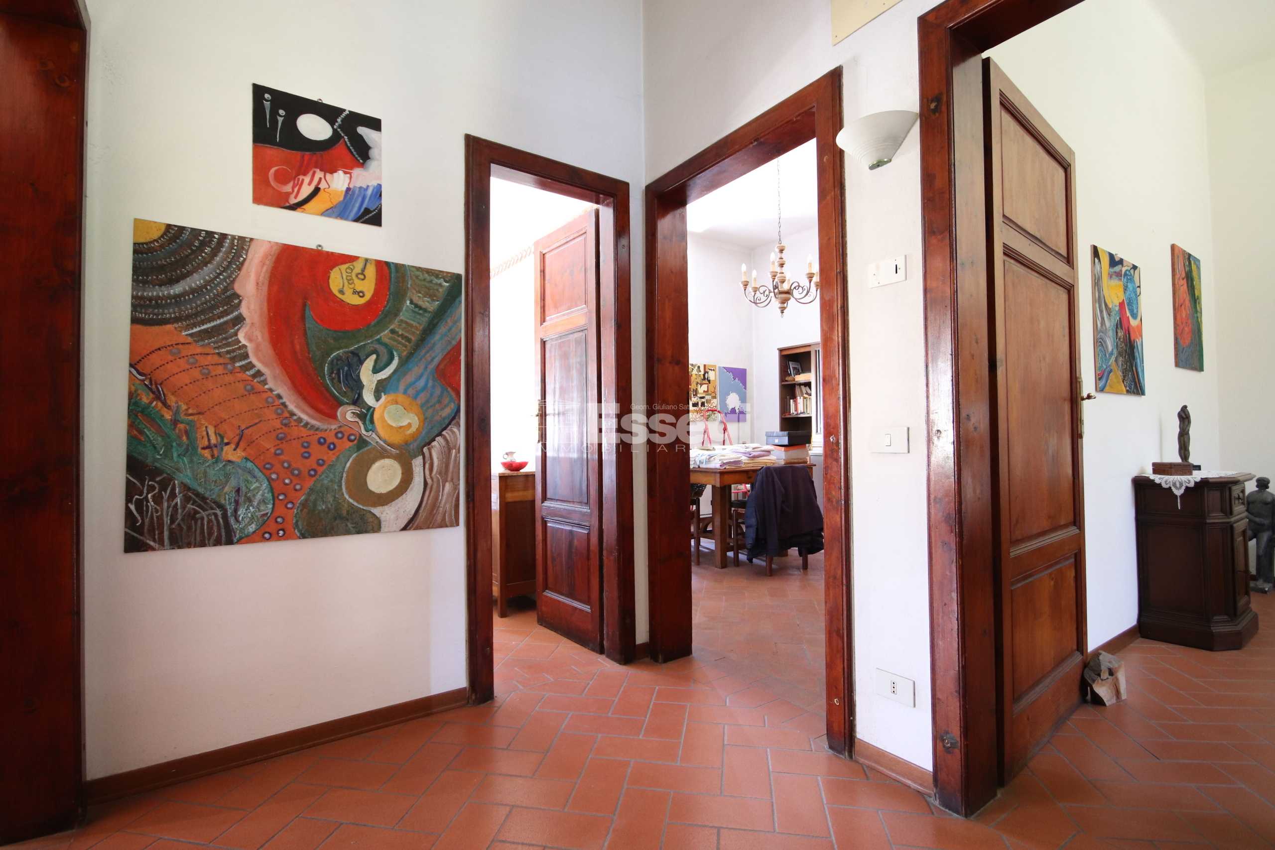 Porzione di casa Via Castruccio Buonamici, Lucca